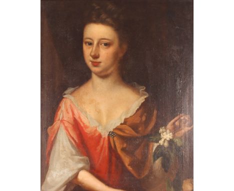 Late 18th / early 19th Century school, portrait study of a young woman holding a sprig of flowers in her left hand, unsigned 
