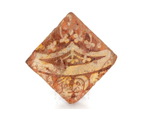 A rare Medieval possible 13th / 14th Century encaustic tile decorated two devils heads, possible Norfolk connections, 11cm&nb