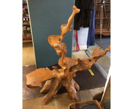 A Reynolds style tree trunk plant pedestal 