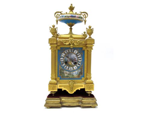 A Late XIX Century French Leroy and Fils, Paris Ormolu Mantel Clock, inset with Sevres style porcelain panels, painted with g