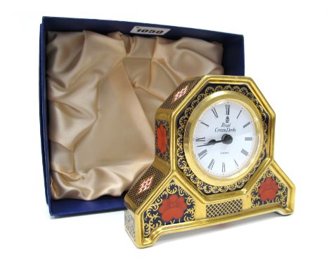 A Royal Crown Derby Porcelain Mantel Clock, decorated in Imari pattern 1128, date code for 1992, 10cm high, boxed.