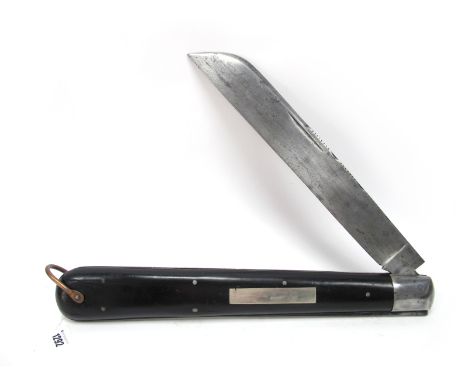 A 20 Inch Shop Display Single Blade Folding Knife, with hardwood scales, open length 94cm.