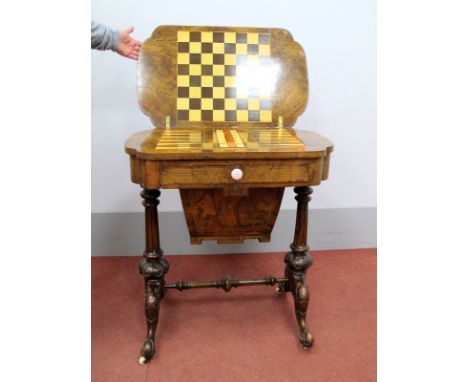 A Mid XIX Century Walnut Games/Work Table, the fold-over top inlaid with chess/backgammon board, single drawer over basket, o