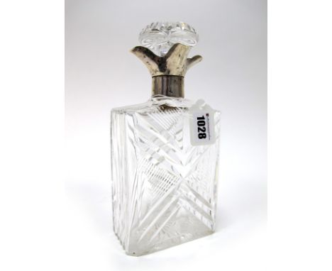 A Cut Glass Decanter and Stopper, of rectangular form, with shaped silver collar, hallmarked for Sheffield 1934 by Walker &am