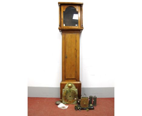 An Early XIX Century Pine Cased Longcase Clock, the plain hood with columns, the trunk with door and plinth base, the eight d