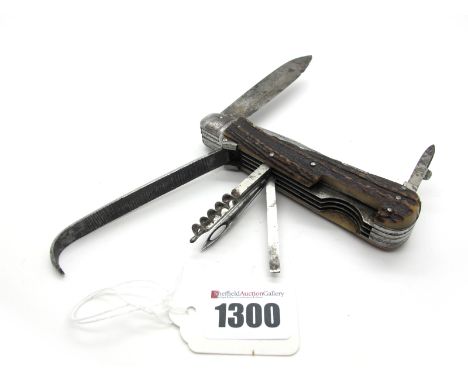 A French Barbelin Thirteen Piece Horseman's Knife, with stag scales, 10.5cm long.