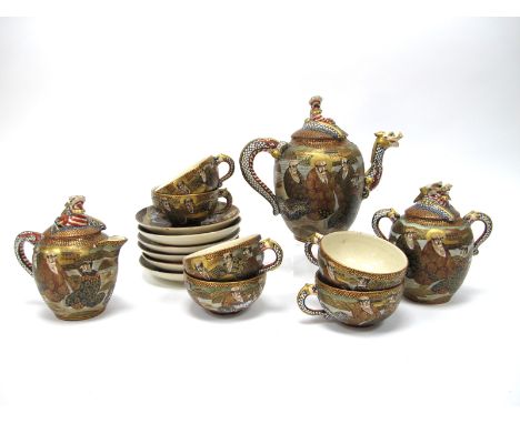 A Late XIX Century Japanese Satsuma Pottery Part Tea Service, elaborately decorated with Deities and dragons, character mark 