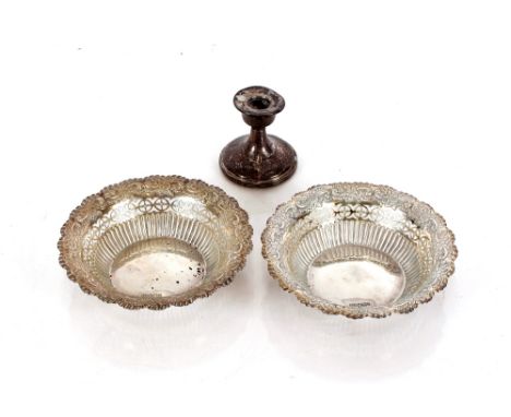 A pair of late Victorian circular silver bon bon dishes, having foliate embossed and pierced shaped borders, Sheffield 1895, 