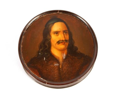 A 19th Century circular&nbsp;papier mâché snuff box, the lid painted with a portrait, 9cm dia.&nbsp;