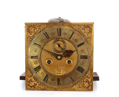 An 18th Century&nbsp;oak long case clock,&nbsp;the hood surmounted by a stepped pediment and gilt finials enclosing brass dia