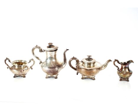 A Victorian four piece silver tea and coffee service,&nbsp;of baluster form, the lids of the tea pot and coffee pots surmount