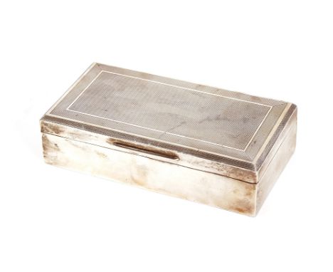 A silver engine turned decorated cigarette case,&nbsp;wood lined interior,&nbsp;London 1952;&nbsp;17cm long&nbsp;