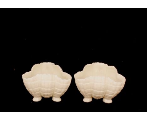 A pair of Royal Worcester blanc de chine shell shaped posy vases&nbsp;	