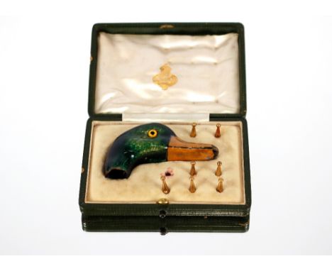 An unusual cased enamel ducks head parasol handle;&nbsp;together with seven parasol tips, fitted case stamped for Edwards &am