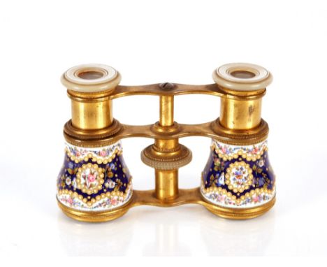 A pair of enamel and gilt opera glasses,&nbsp;having foliate decoration and mother of pearl eye pieces