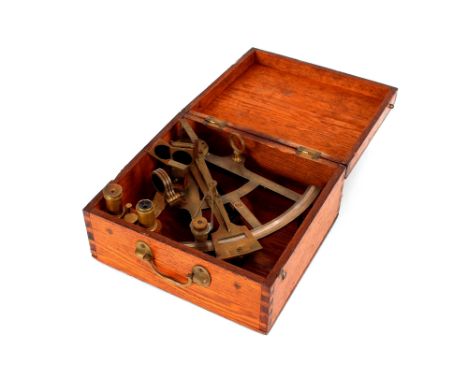 An oak cased brass sextant,&nbsp;by A. Harris, West Hartlepool, brass and silvered scale