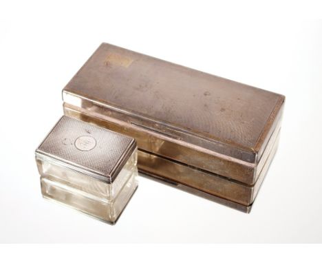 A silver wood lined cigarette case,&nbsp;London 1945; and a silver mounted glass dressing table tidy (2)