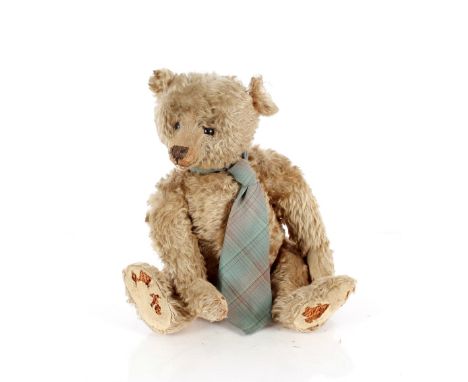 A well loved Steiff Teddy bear,&nbsp;37cm high in a sitting position AF in need of restoration and button missing