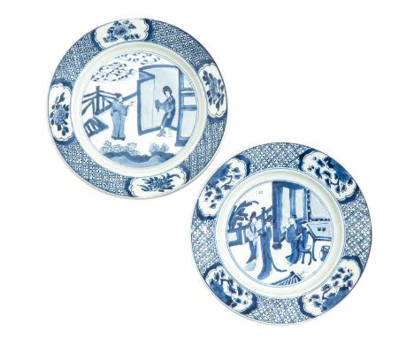 Depicting gathering of Chinese figures, border is decorated with cartouches of flowers, Kangxi Period, 21 cm. in diameter, fr
