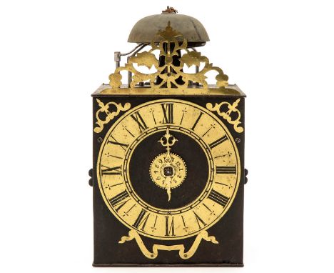 A Classic eight-day striking Morbier wall clock with alarm, ca. 1725.  The clock comes with weights, pendulum and wall bracke