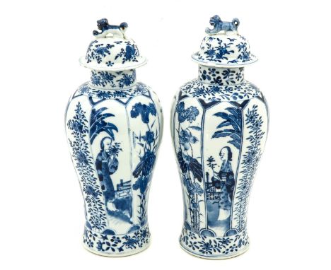 Depicting alternating scenes of Chinese ladies with flowers, Kangxi mark, 33 cm. tall, chip and hairline.