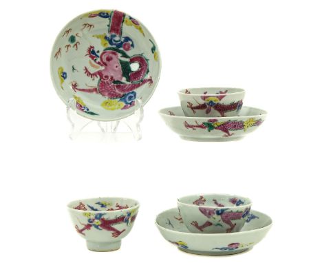 Dragon and cloud decor in Famille Rose enamels, saucers are 12 cm. in diameter, chip and hairline.