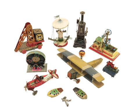 a large collection of vintage tin toys, including Wilhelm Krauss Cromatrope, steam engine and airplanes, longest 32 cm.