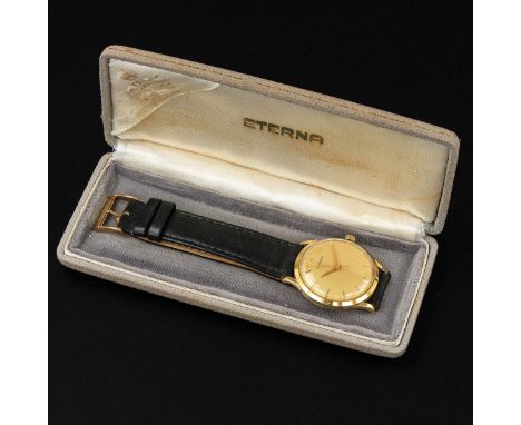 brand Eterna, gold case, on leather strap, 1950s, case diameter 33 mm.