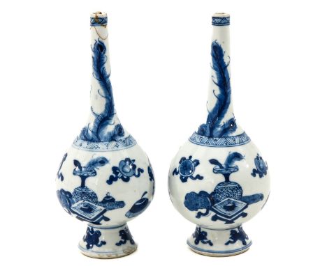 Decorated with Chinese Antiquities, Kangxi Period, 20 cm. tall, one vase with restoration on rim.