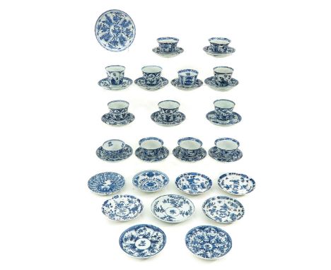 In a variety of blue and white decors, including Kangxi Mark and Period, largest saucer is 13 cm. in diameter, chip and hairl