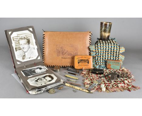 A collection of miscellaneous items, including an album of postcards of famous early 20th Century film and theatre actors and