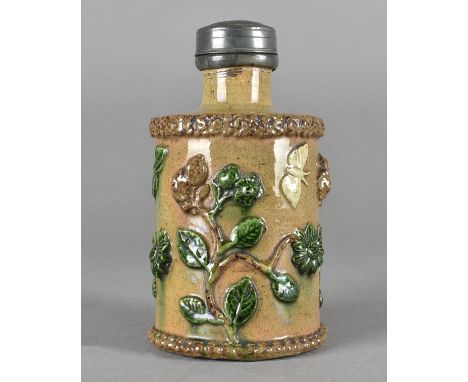 A 19th Century earthenware cylindrical tea caddy, with applied floral decoration painted in colours with pewter collar and sc