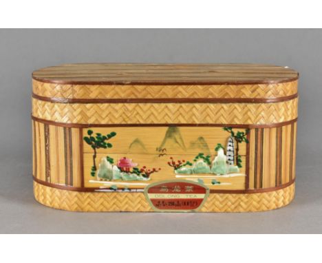 A Mid 20th Century straw work tea caddy, containing 250g of Oolong tea
