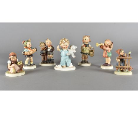 A collection of Goebel pottery figures, mostley Hummel examples (7)