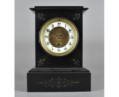 A Fehrenbach Bros slate mantel clock, with white enamel chapter ring, arabic numerals, French drum movement, 27 cm high x 19 