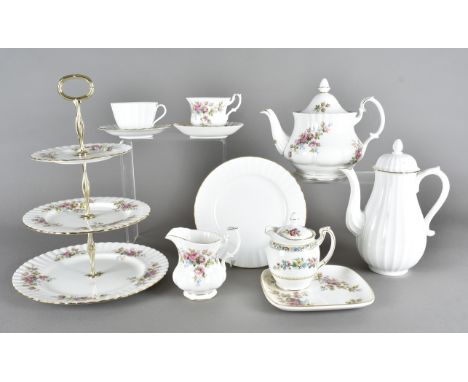 A Royal Albert 'Moss Rose' part tea service, with five cups, a teapot, milk jug, cake plate etc together with a six place set