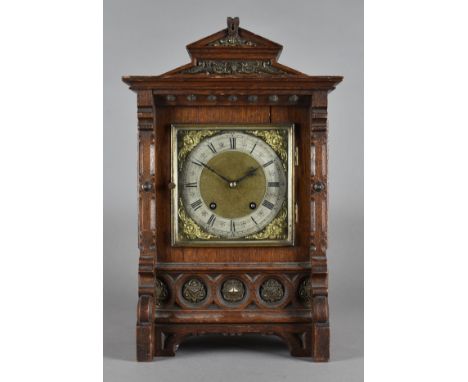 A Victorian oak and brass mounted eight day mantel clock, with Lenzkirch brass movement, 45 cm high x 28 cm wide x 20 cm deep