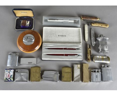 A collection of penknives, including a Swiss Army example and various pens, lighters and other items etc
