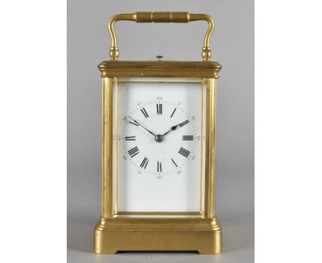 A 19th Century brass carriage repeater carriage clock, brass case, white enamel face, roman numerals, Arabic second numbers 1