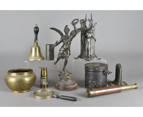 A pair of cast iron blacksmith book rests, an art nouveau pewter naturalistic vase, a three draw brass and leather telescope 