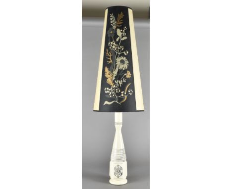 A 1960's carved lamp and shade, the cream body with floral tapered shade22 barrel for this gun.