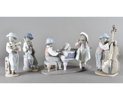 A Lladro child's Jazz band figure collection, comprising a large group of a piano player and his female singer, and three mus