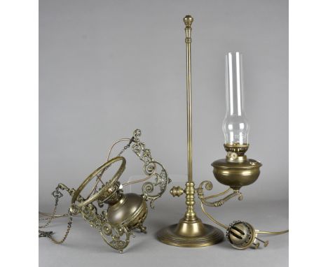 A Victorian style brass desk lamp, now converted to electricity, together with a brass ceiling light converted to electricity