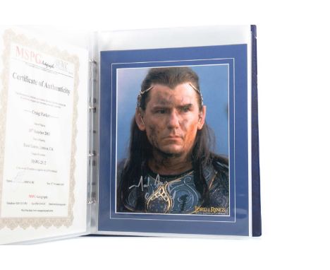TWENTY-ONE SIGNED LORD OF THE RINGS PROMOTIONAL PHOTOGRAPHS,including Sir Ian McKellen, Peter Jackson, Elijah Wood, Liv Tyler
