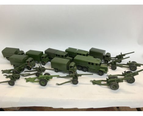 A Box Containing a Collection of Military Dinky Toys. Including Army Wagons. Medium ArtilleryTractors and Guns.