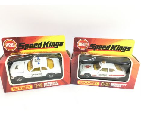 A Boxed Macthbox Mercedes Police Car K-61 and a Emergency Doctor K-62. Both Un punched.