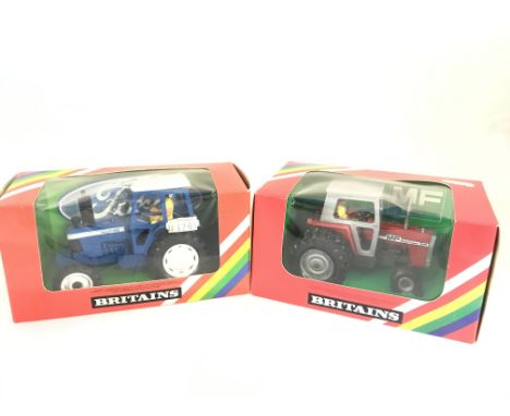 2 X Boxed Britains Tractors a Ford TW20 Tractor #9523 and a Massey Ferguson tractor #9529.