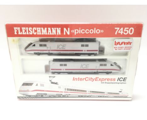A Boxed Fleischmann N Gauge Piccolo #7450 Intercity Express ICE. And a Set Of 3 Carrigies.