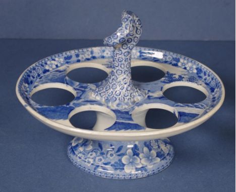 Spode blue and white footed egg stand 'Milkmaid' pattern, with twisted central handle. H15cms approx (total). Impressed SPODE