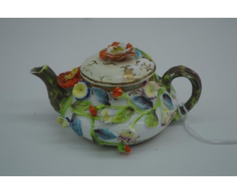 Spode flower encrusted miniature teapot painted mark & no 4788 to base, 4.5cm high approx., restored lid & some chips